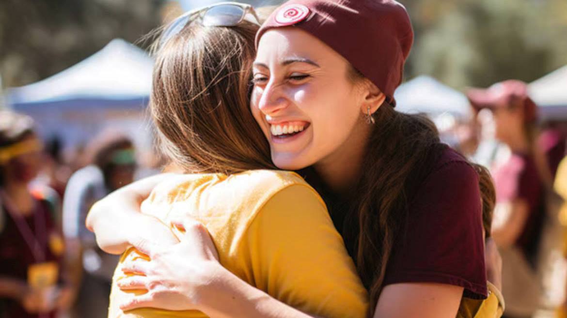 Un po' incredula, ma contenta ha ricambiato l'abbraccio con un grande sorriso. 